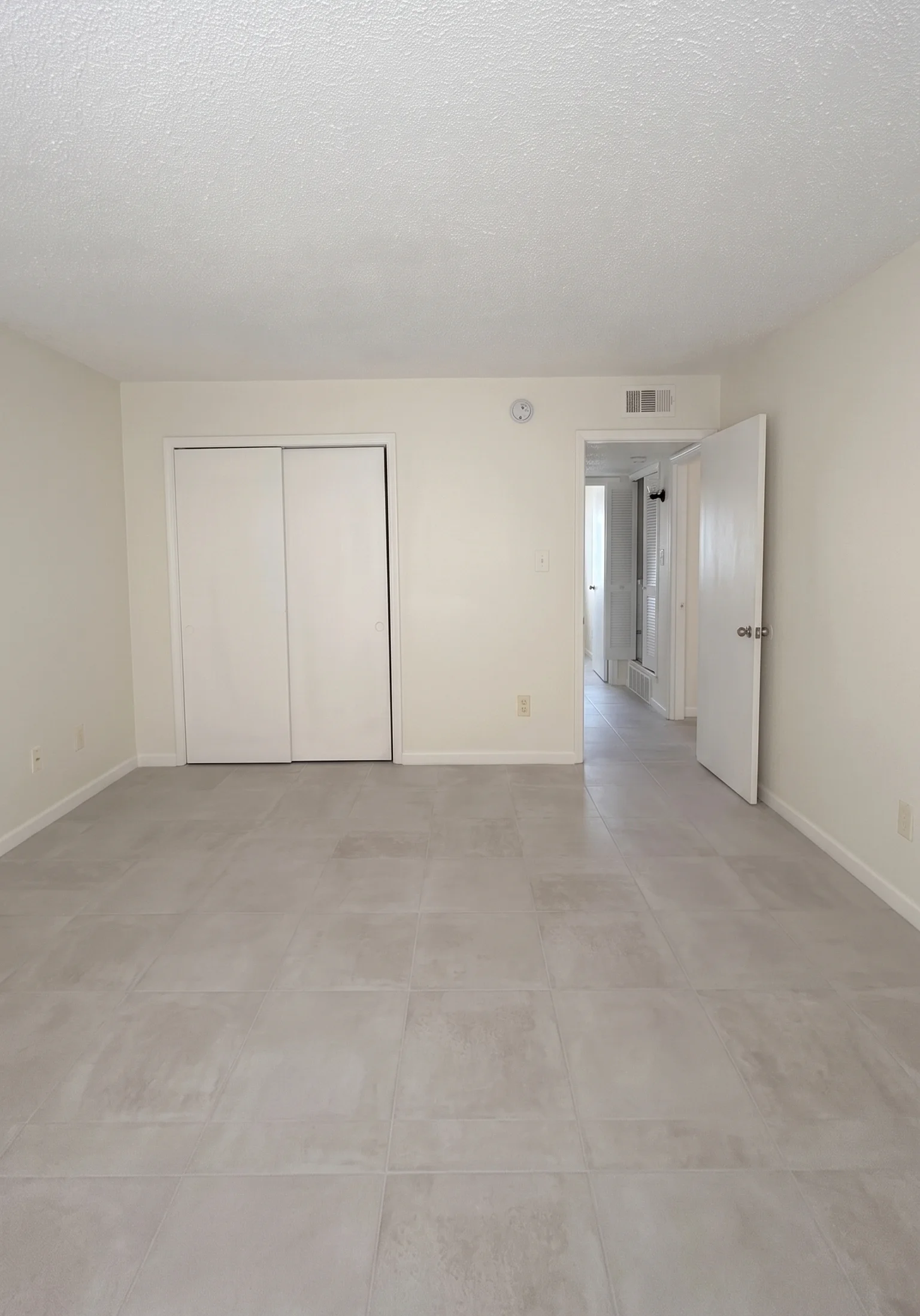 Apartment room with generous closet storage