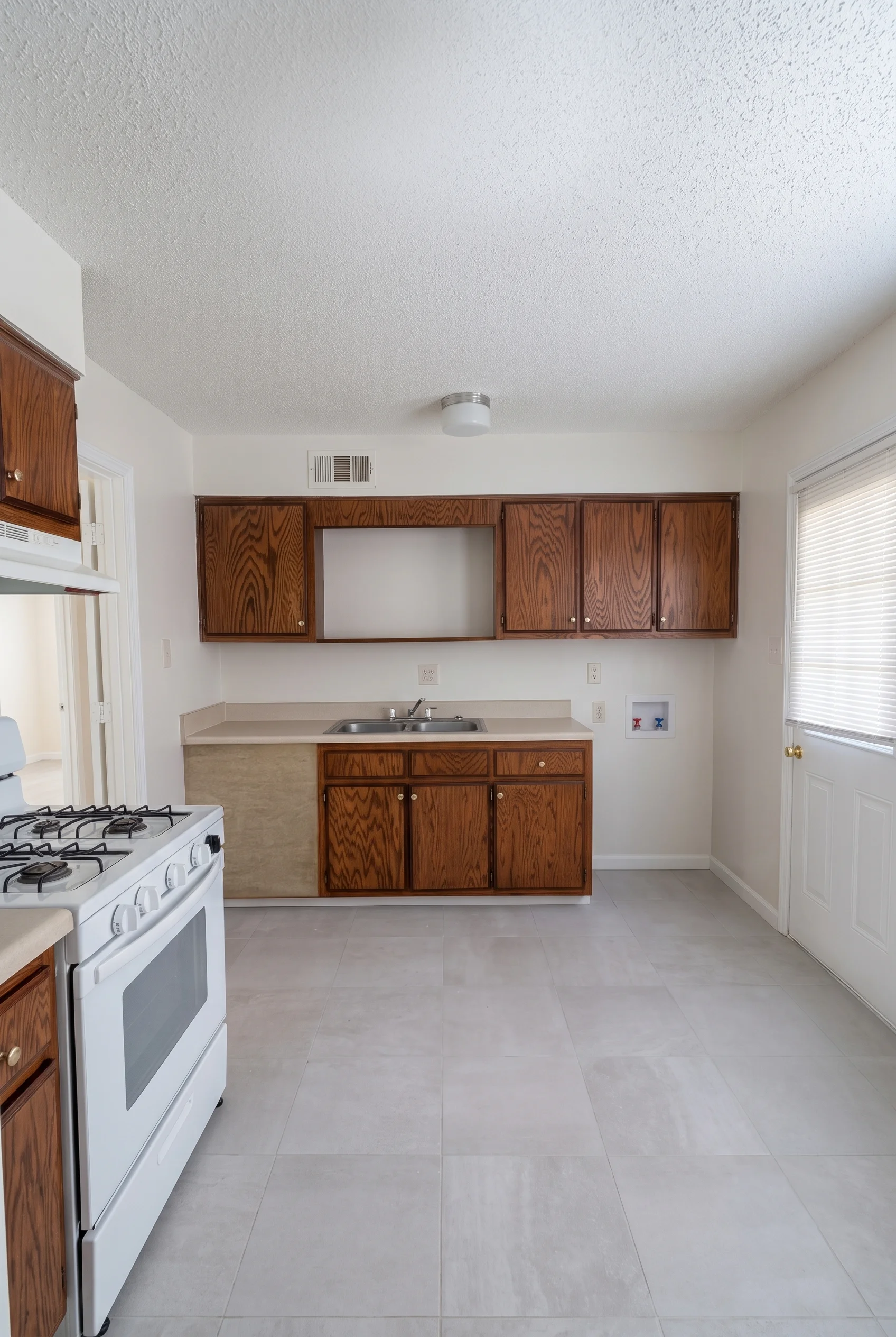 Valley Forge apartment kitchen with wood cabinetry